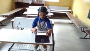 A student learns to use technology | Samridhdhi Trust